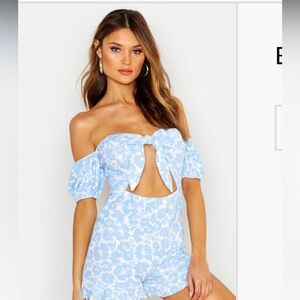 Floral knit off the shoulder romper